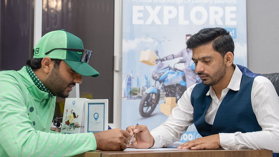 Emirates Way Delivery Services Operations Manager Guiding Project Details to Rider