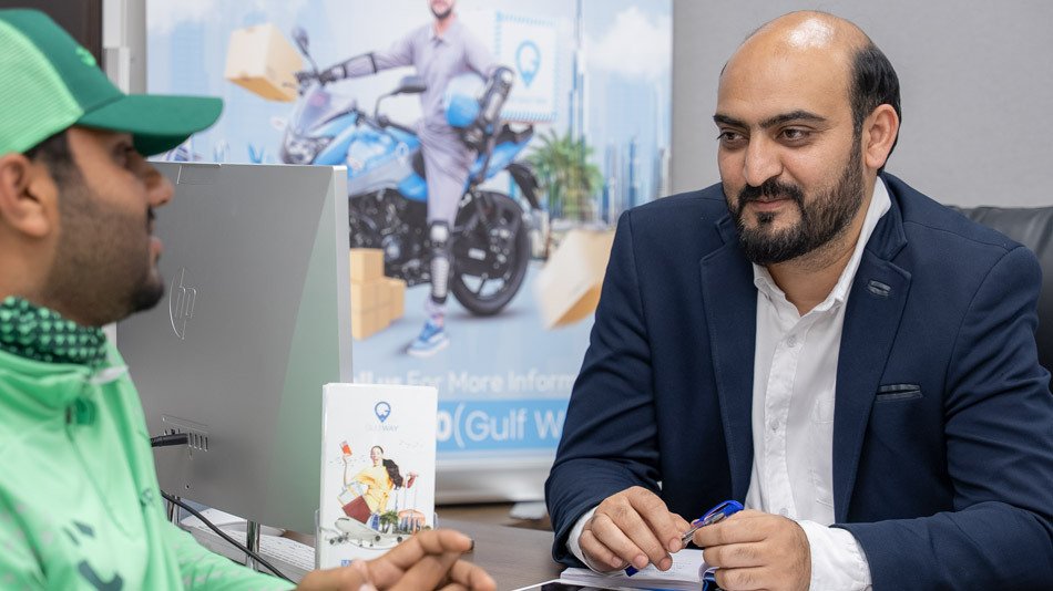 Emirates Way Delivery Services Asst Operations Manager Guiding Project Details to Rider