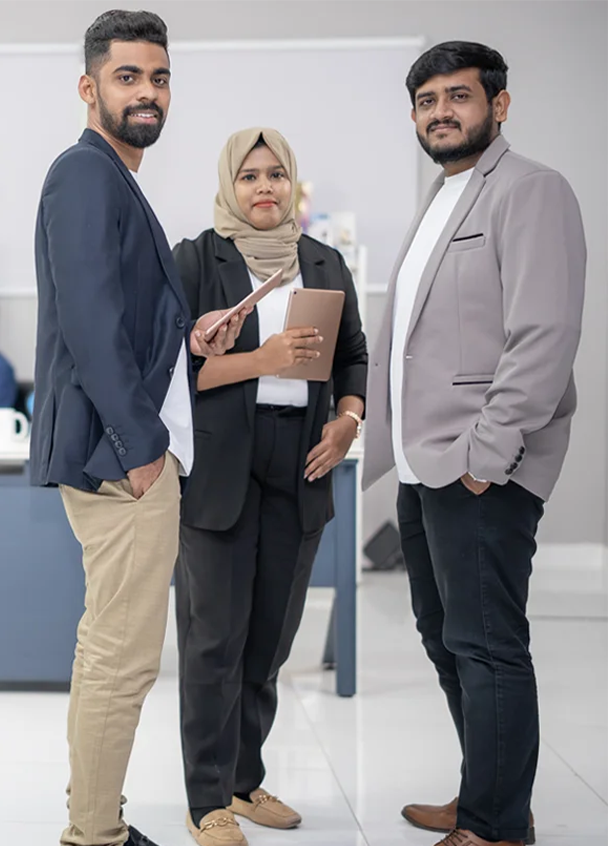 Emirates Way Delivery Services media and marketing team members discussing about the campaigns facing Camera