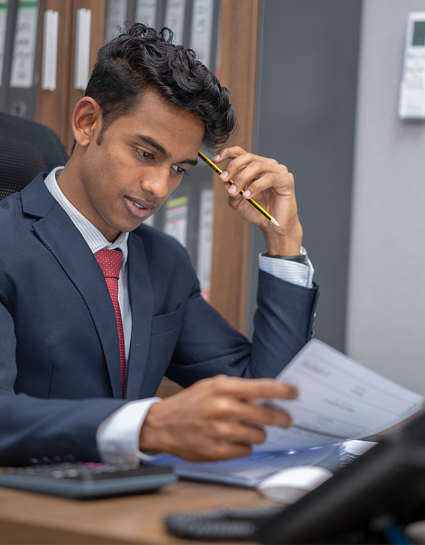 Emirates Way Delivery Services Accounts Team Member checking the Rider Loans from the Company
