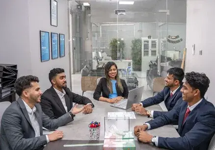 Emirates Way Delivery Services Accounts Team Members making planning for managing Riders Salaries