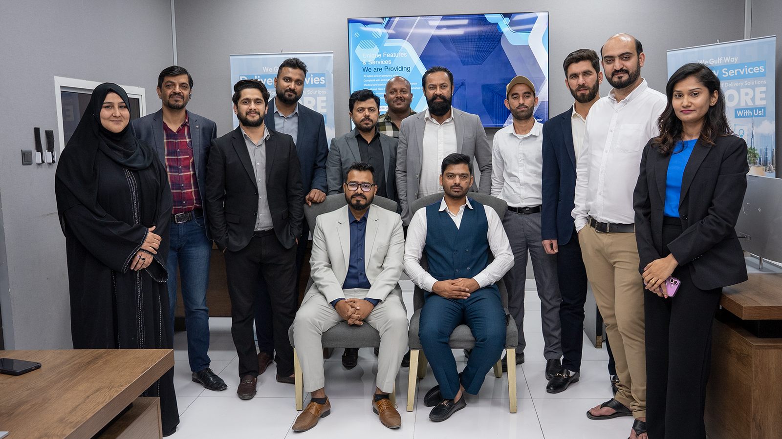 Emirates Way Delivery Services Operations Team Facing Camera